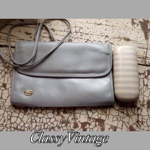 1970's Phillippe grey leather convertible bag.